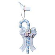 A baby shower ornament shaped like a candy cane with a large bow, decorated with pastel blue and white stripes, alphabet blocks spelling 'ABC', and a hanging ribbon at the top.