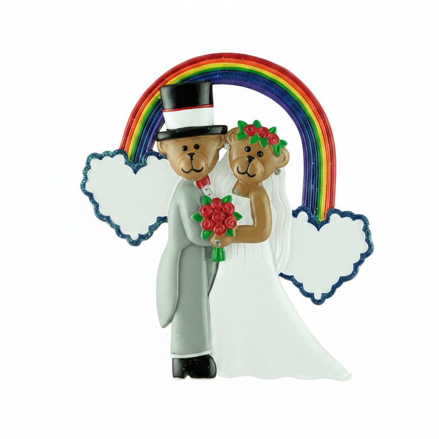 Ornament of two bears, one in a suit and top hat, the other in a wedding dress, with a rainbow and clouds in the background.